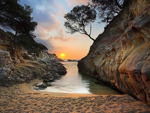 A gentle sunset in a bay on the Costa Dorada, Spain