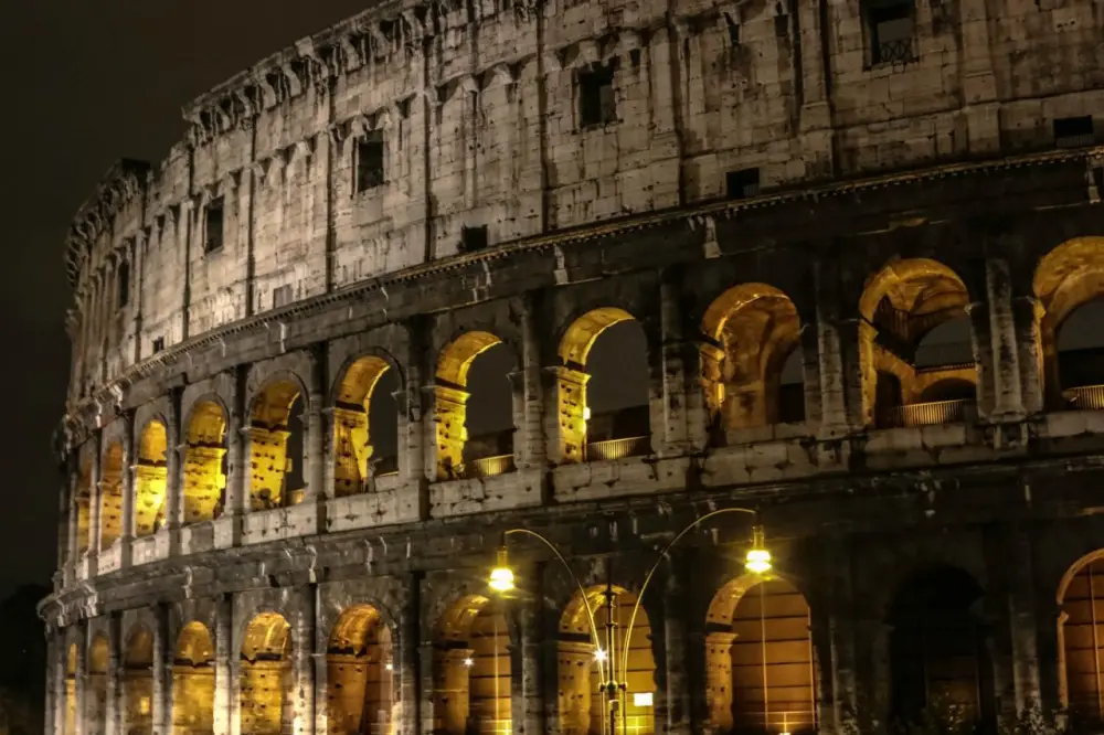 Magnificent and ancient Rome, colored by the lights of the autumn night
