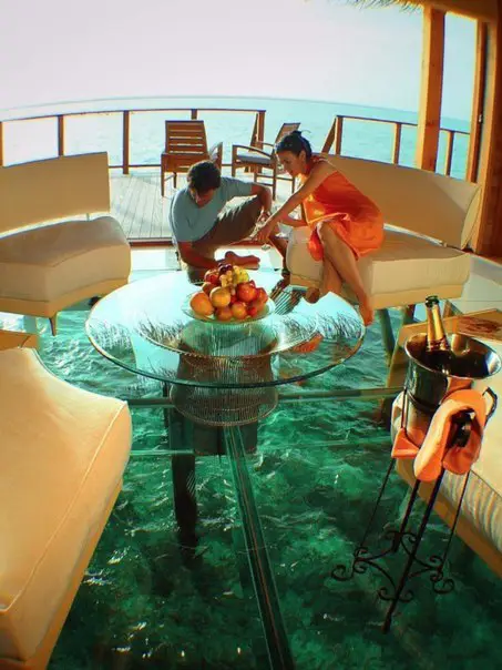 Room in hotel with glass floor, Maldives.