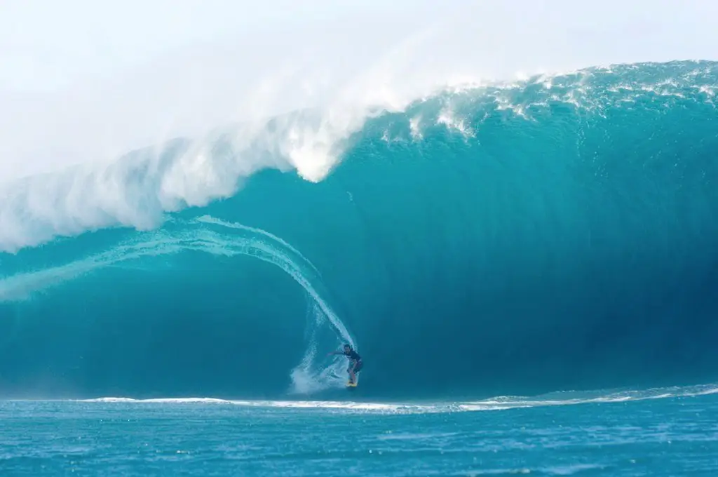 Surfer off the coast of the island of Maui