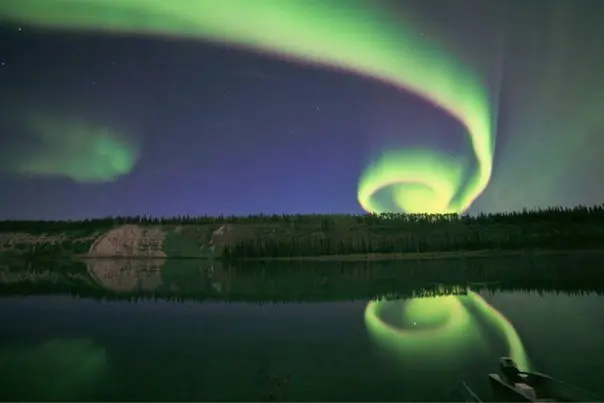 Northern lights above the river, Canada