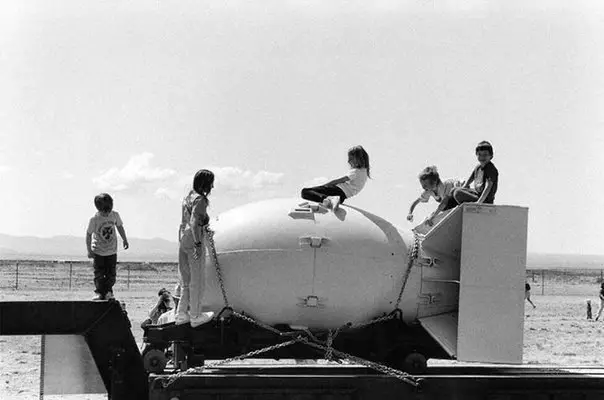 Children play on the body of the atomic bomb, 1992