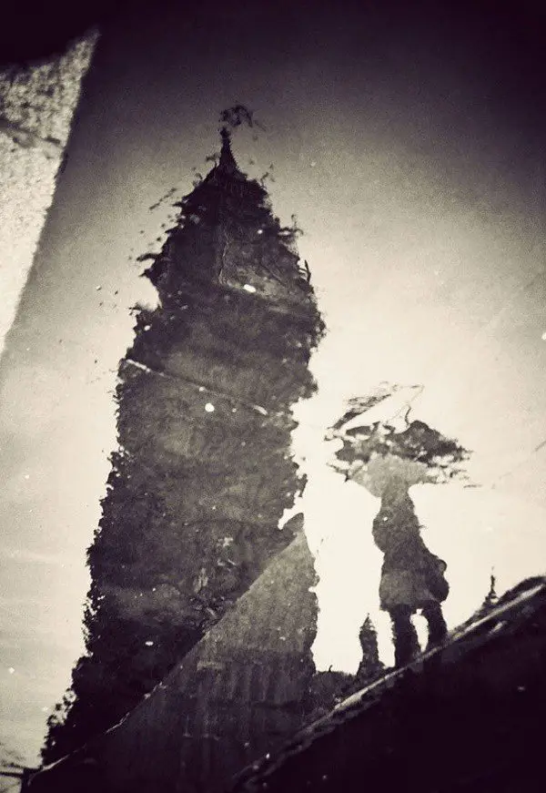 London in reflections puddles