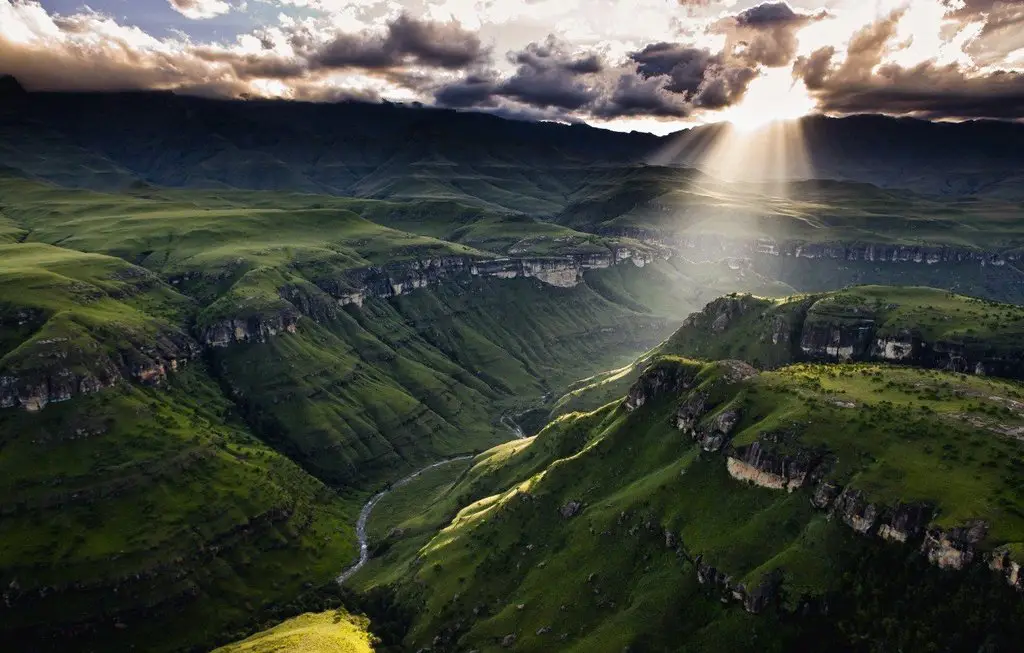The sun rises over the Dragon Mountains, South Africa