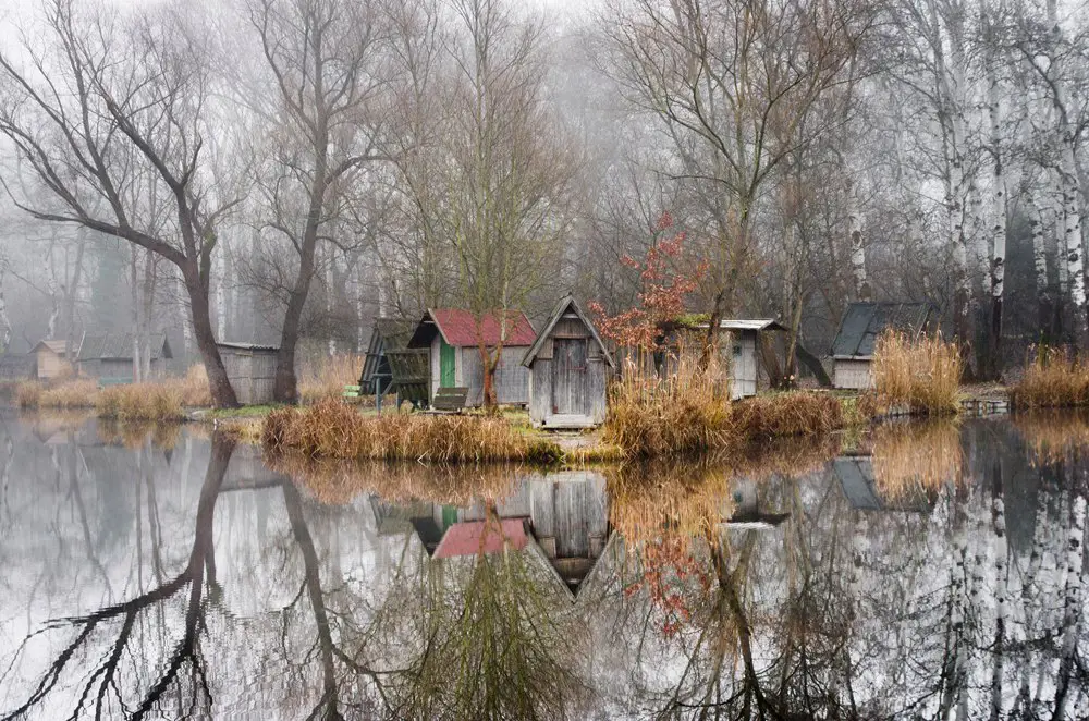 Atmospheric lake with fishing lodges near Budapest