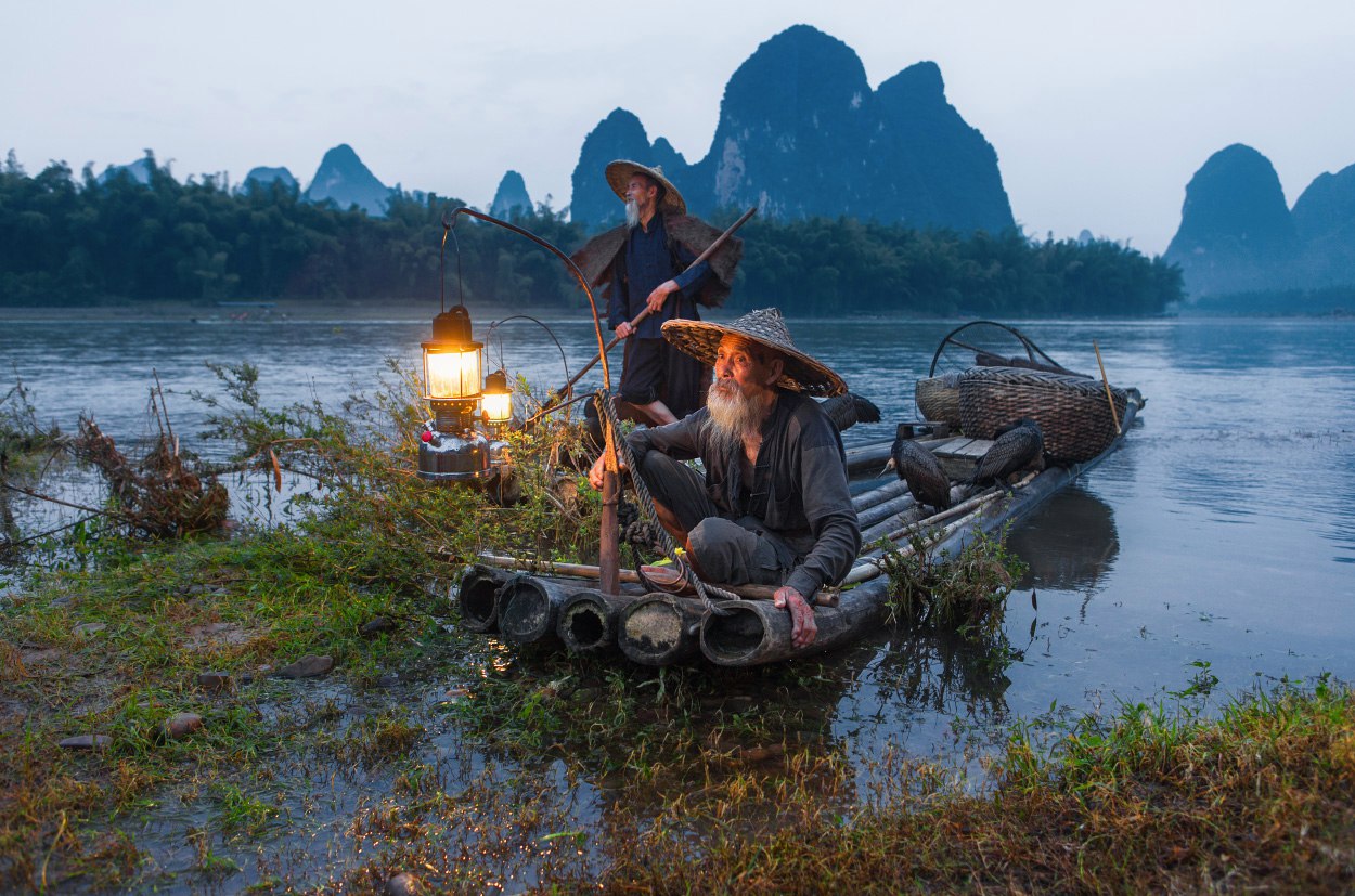 Chinese fishermen with cormorants on the Li River, Guangxi Province