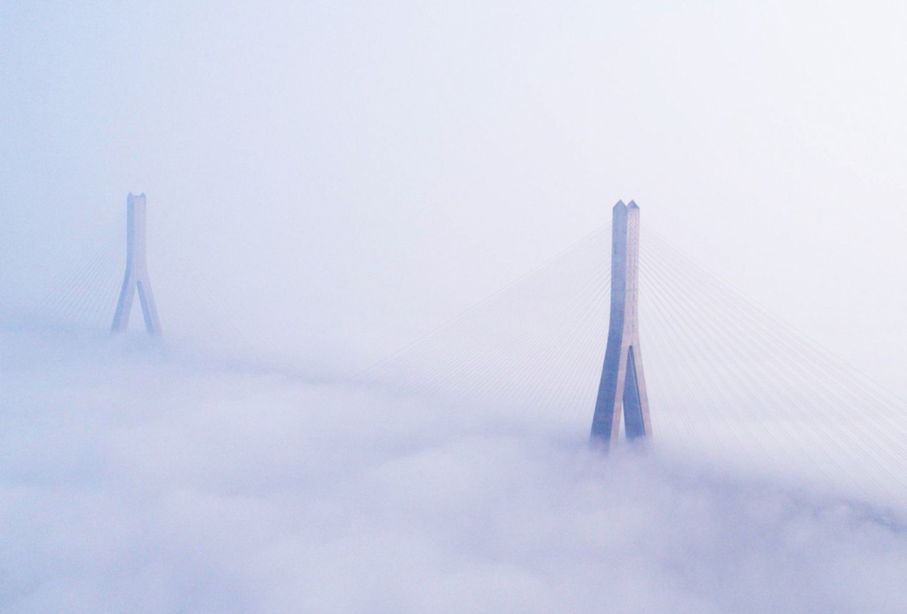 Tianxing Bridge in the fog, Wuhan, China.