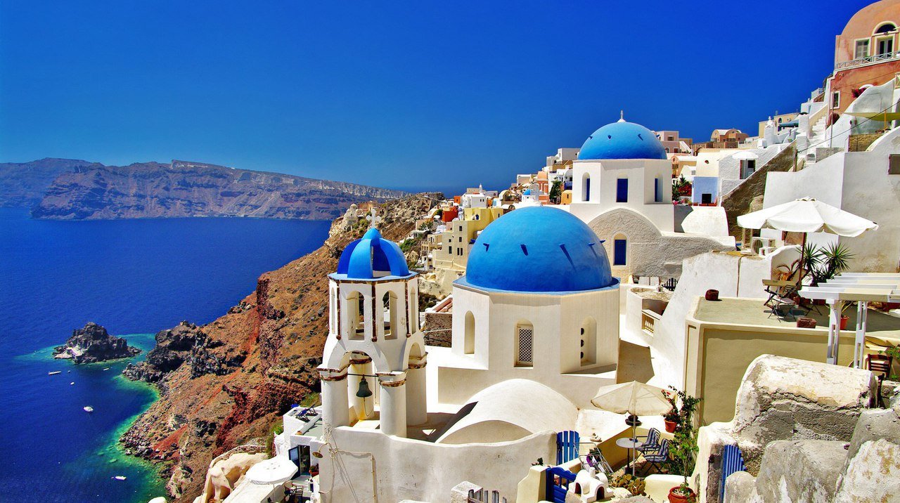 Now would wave at sunny Santorini