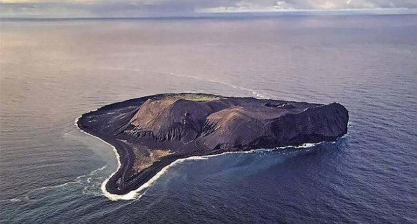 An island that no one can get to and that did not exist until 1963