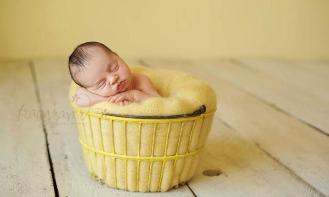 Sleeping babies in the photographs Tracy Raver