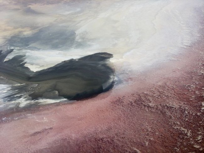 Red and pink Lake Natron in Tanzania