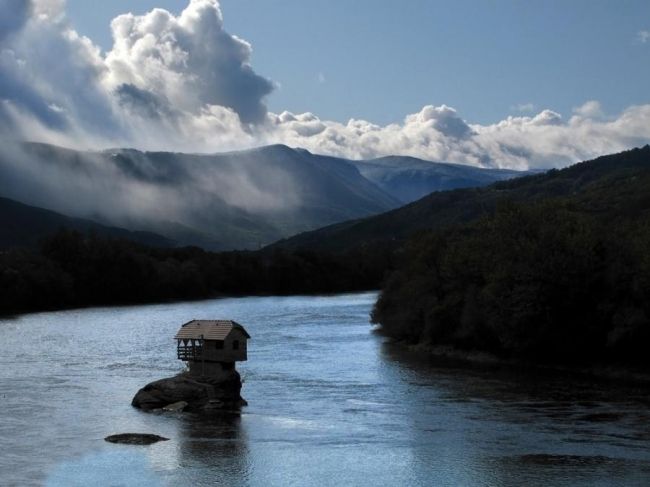 House on the river in Serbia