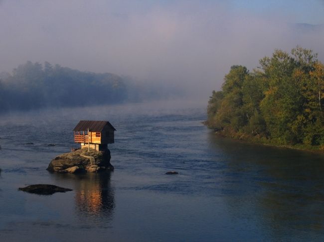 House on the river in Serbia