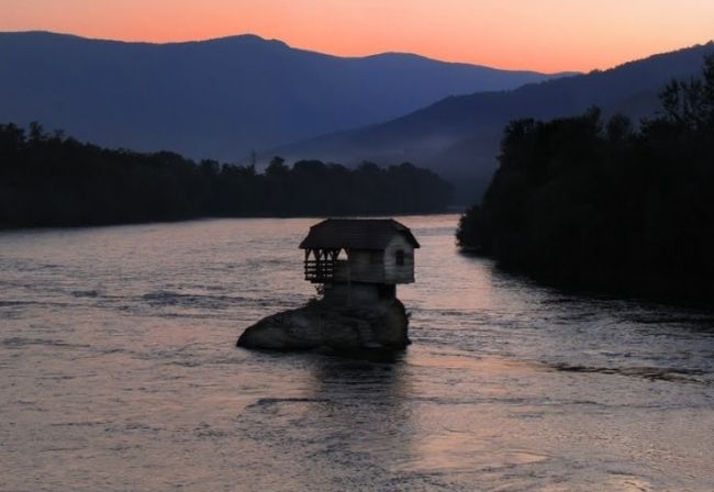 House on the river in Serbia