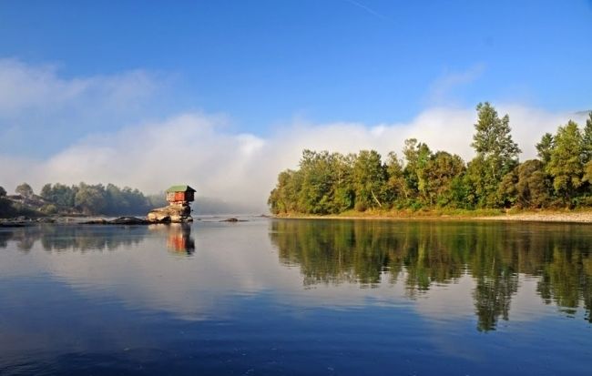 House on the river in Serbia