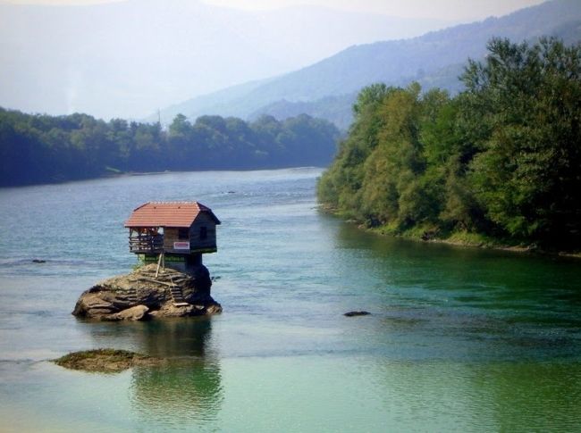 House on the river in Serbia