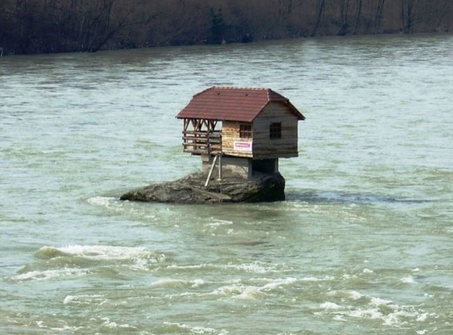 House on the river in Serbia