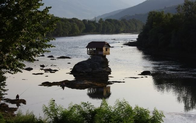 House on the river in Serbia