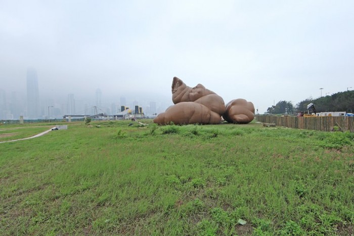 Inflatable heaps, pig and locust in Hong Kong