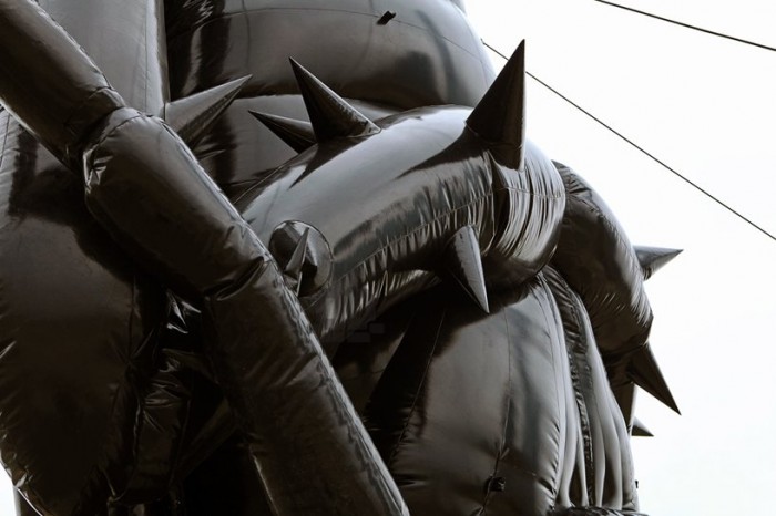 Inflatable heaps, pig and locust in Hong Kong