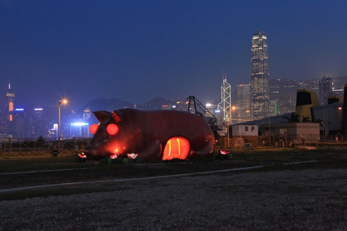 Inflatable heaps, pig and locust in Hong Kong