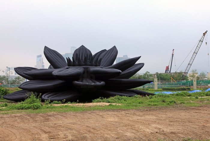 Inflatable heaps, pig and locust in Hong Kong