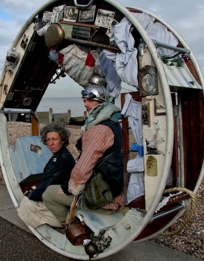 Traveling acrobats in a circular house on wheels