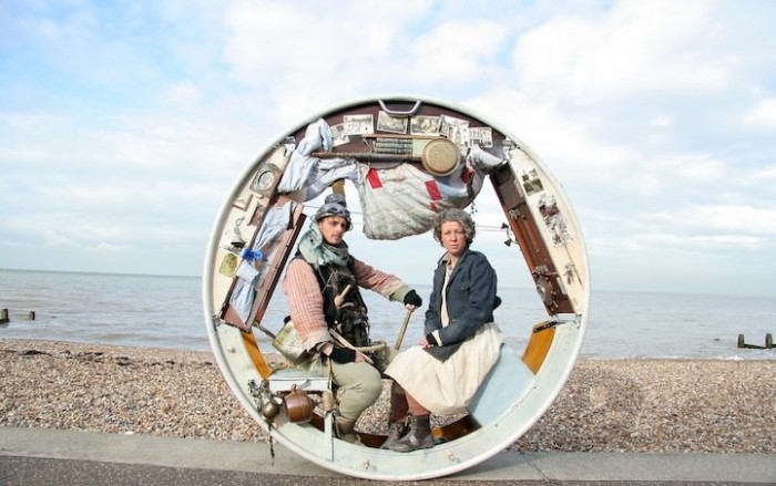 Traveling acrobats in a circular house on wheels