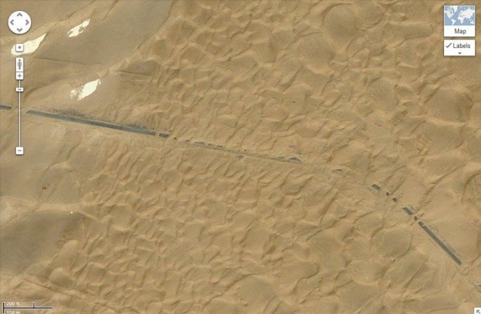 The green border of the world's longest highway through the desert