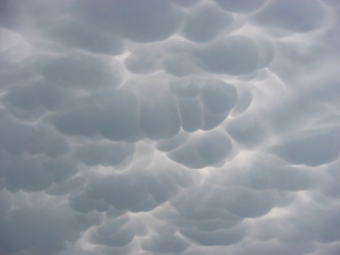 Unusual rare clouds Mammatus and Undulatus asperatus