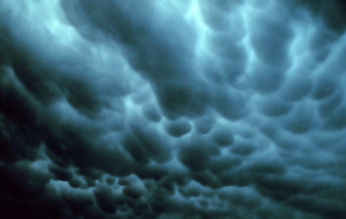 Unusual rare clouds Mammatus and Undulatus asperatus