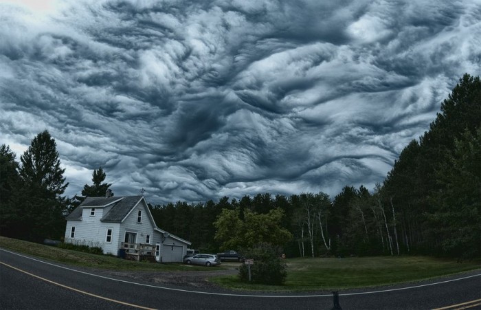 Unusual rare clouds Mammatus and Undulatus asperatus