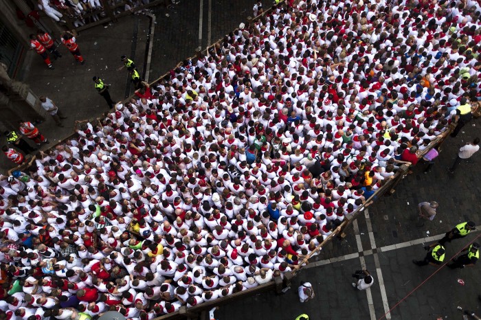 The Festival of San Fermin 2013 and the flight from the bulls