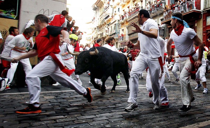 The Festival of San Fermin 2013 and the flight from the bulls