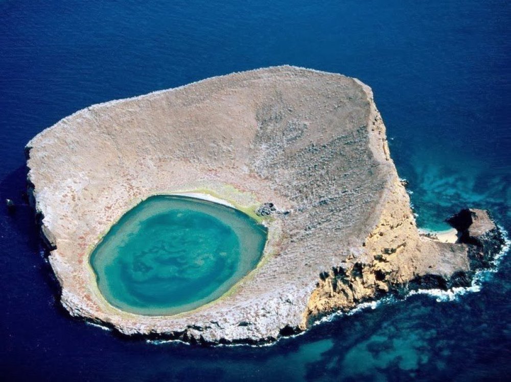Bainbridge Rokas & unusual island with a crater in the Galapagos archipelago