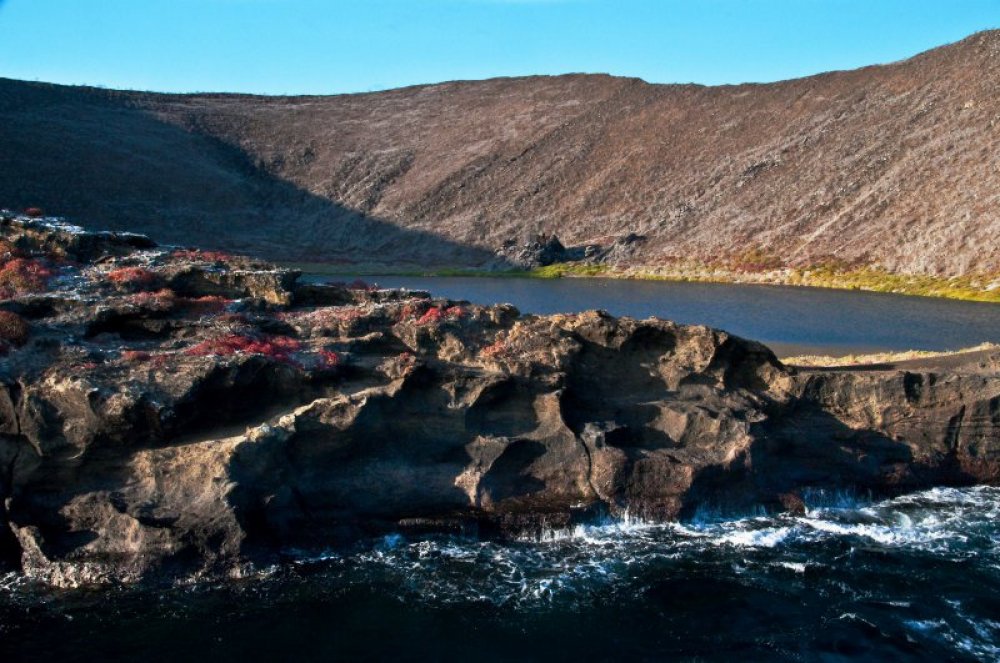 Bainbridge Rokas & unusual island with a crater in the Galapagos archipelago