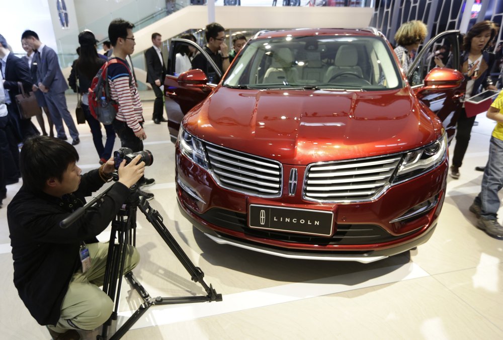 Walking through the car dealership in Beijing