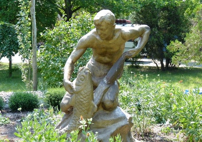  Monument of a Young Man with a Towel and Fish , Berdyansk 