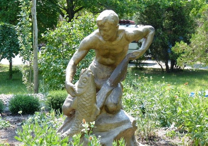  Monument of a Young Man with a Towel and Fish , Berdyansk 