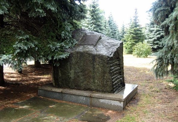 Memorial sign on the site of mass executions of citizens in 1941-1943