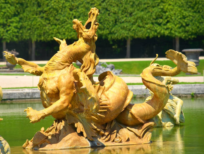 Statue of a sea monster in the garden of Versailles.