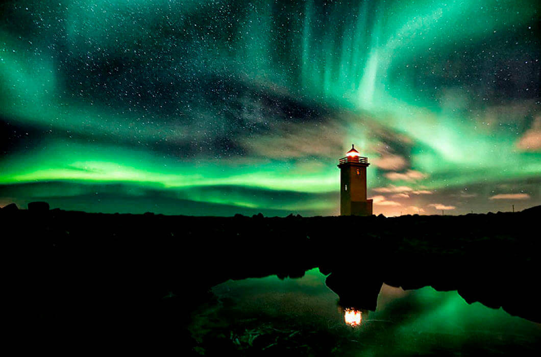 Lighthouse in the Northern Lights, Iceland