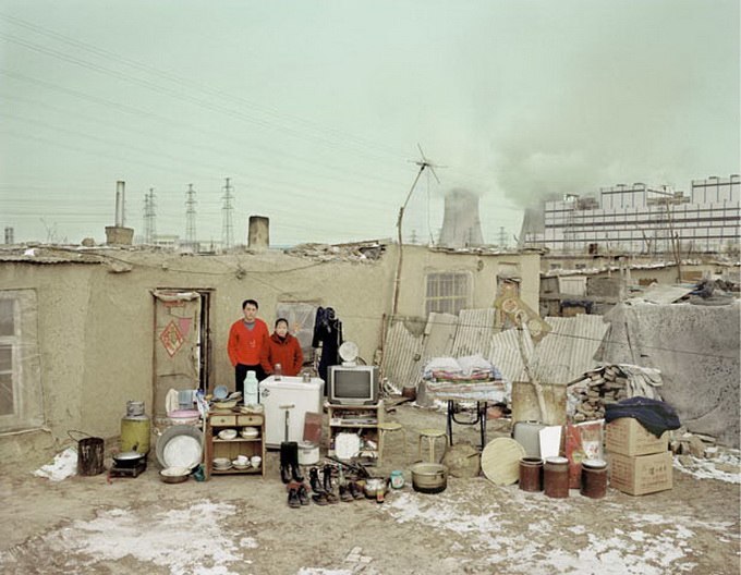 The project by the Chinese photographer Hong Qingjun is called “Family Materials”. - 5