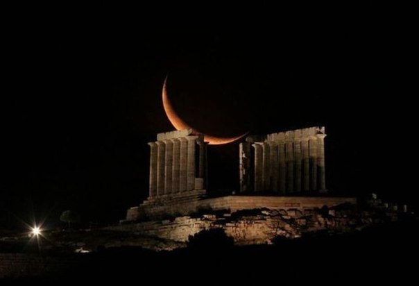 Moon over the temple of Poseidon at Cape Sounion, Greece