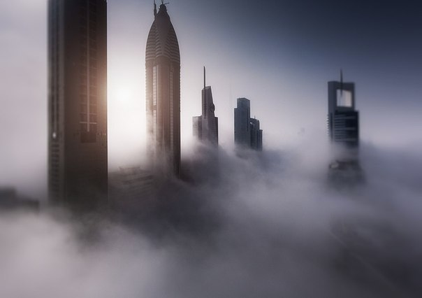 Dubai skyscrapers in the evening mist, UAE