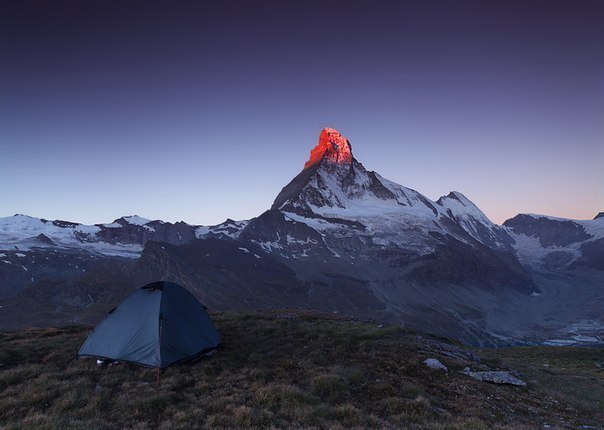Matterhorn Mountain. Alps. The top of the mountain at dawn is similar to hot metal
