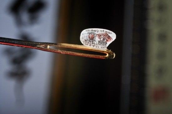 Потрясающие миниатюрные шедевры на зернах риса - 2