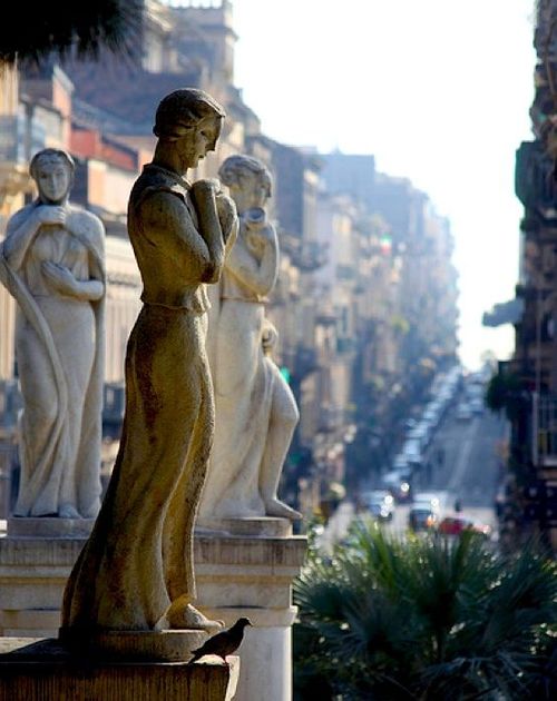 The port city of Catania in the background of the volcano Etna, Sicily, Italy - 2