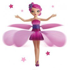 Оригинальная игрушка — Летающая Фея Flying Fairy способна летать не сталкиваясь с препятствиями! Это мечта для любой девочки. Сказочная фея волшебно парит в воздухе. Она держит дистанцию от любой поверхности (от пола, ладони и пр.)<br>Заказать фею можно н